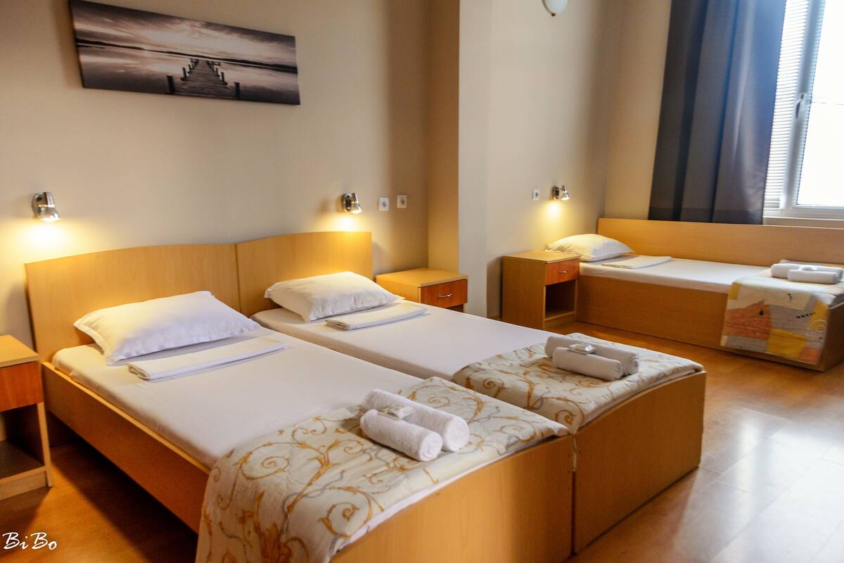 Triple Room 304 | Egyptian cotton sheets, premium bedding, desk