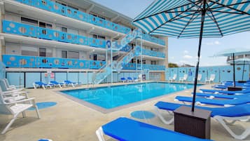 Seasonal outdoor pool, a heated pool, pool loungers