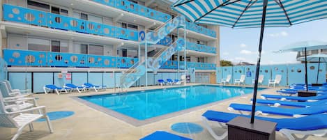 Seasonal outdoor pool, a heated pool, pool loungers