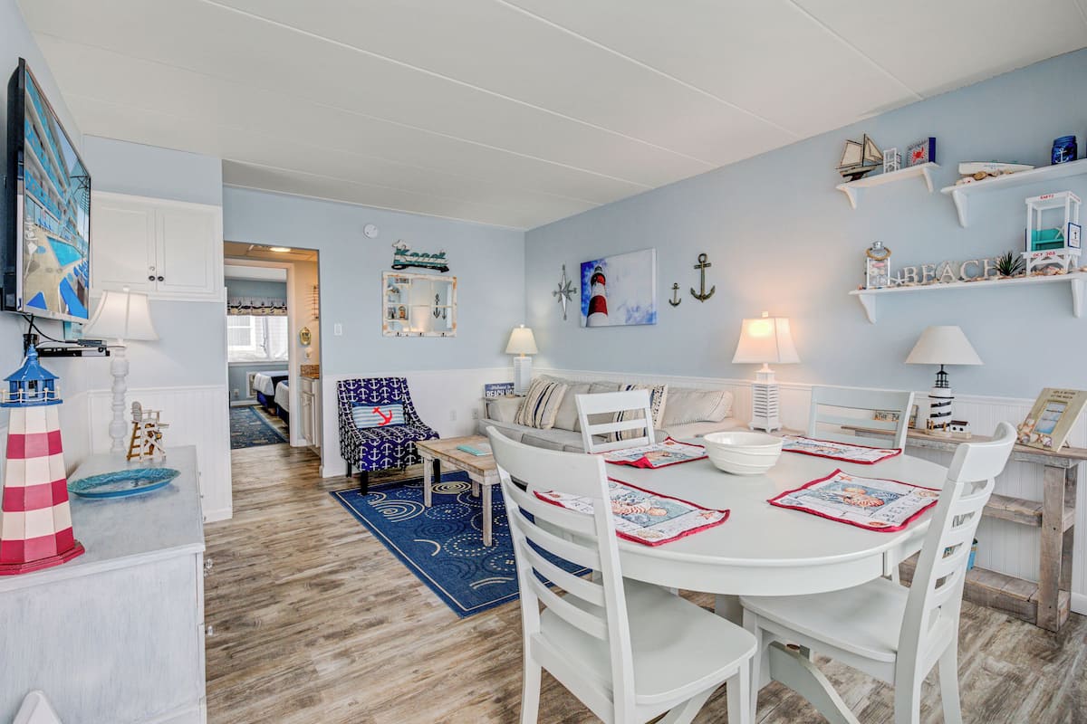 Suite 303 | Living area | Flat-screen TV