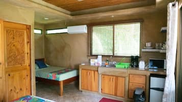 Standard Studio Suite, Multiple Beds, Non Smoking, Garden View | Pillow-top beds, individually decorated, individually furnished