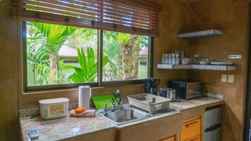 Mini-fridge, microwave, stovetop, coffee/tea maker