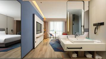 1 King Standard Extra Floor Space | Premium bedding, down duvets, laptop workspace, blackout curtains