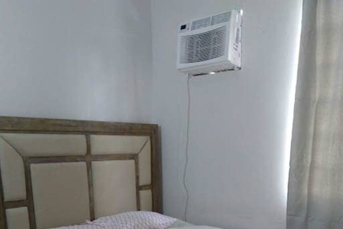 Family Room, Non Smoking | Blackout drapes, iron/ironing board (on request), bed sheets