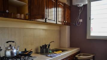 Apartment | Private kitchen | Full-size fridge, microwave, oven, stovetop