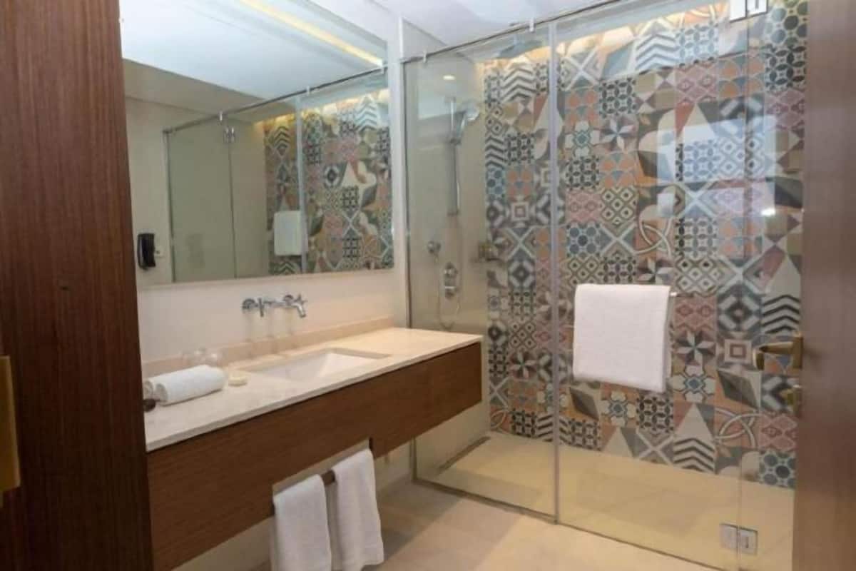 Bathroom | Separate bathtub and shower, free toiletries, hair dryer, bathrobes