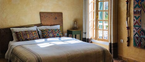 2 bedrooms, blackout curtains, iron/ironing board, rollaway beds