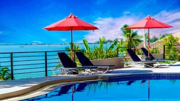 2 outdoor pools, open 6:00 AM to 9:00 PM, pool umbrellas, sun loungers
