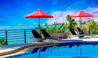 2 outdoor pools, open 6:00 AM to 9:00 PM, pool umbrellas, sun loungers