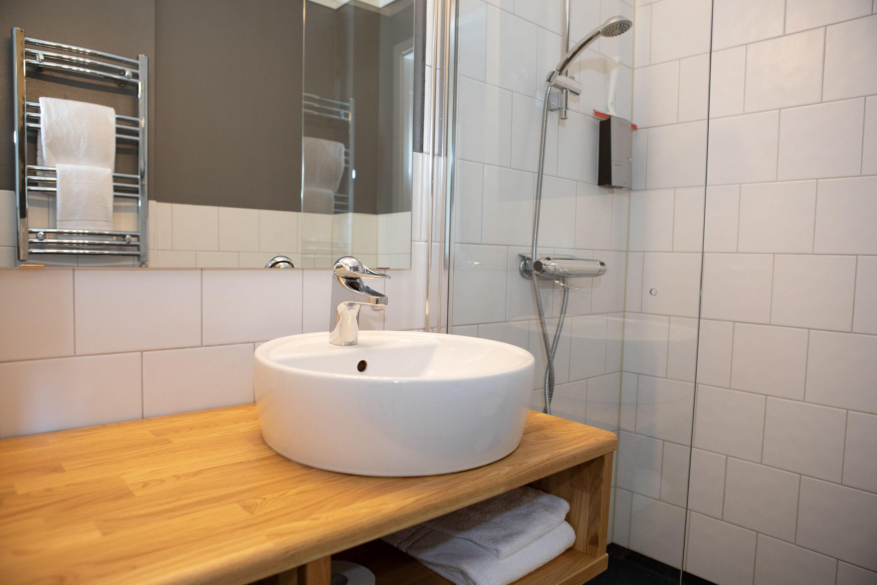 shower, free toiletries, hair dryer, towels