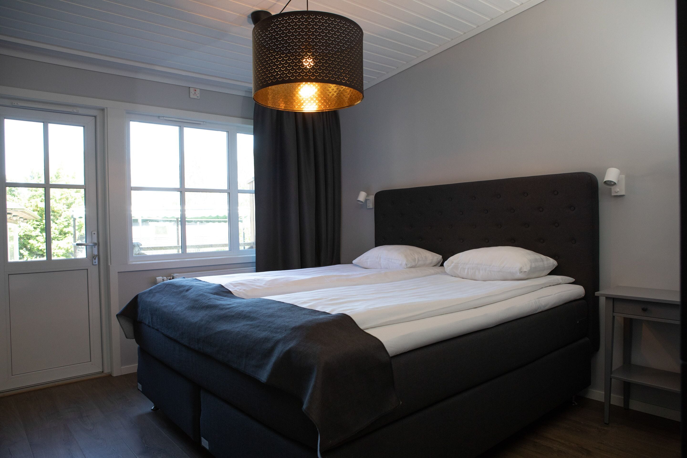 family quadruple room, multiple beds, non smoking, ground floor | desk, blackout curtains, free wifi, bed sheets