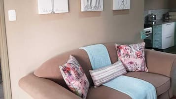 Deluxe Cottage, 2 Bedrooms | Living area | TV