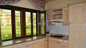 Apartment, 2 Bedrooms | Private kitchen | Coffee/tea maker, fridge, microwave, oven - Appartement Astrance (Ifrane)