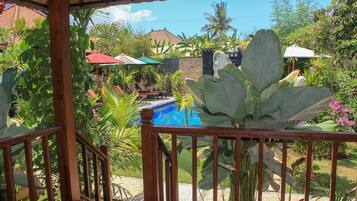 Deluxe Double Room, 1 King Bed, Balcony, Garden View | Terrace/patio