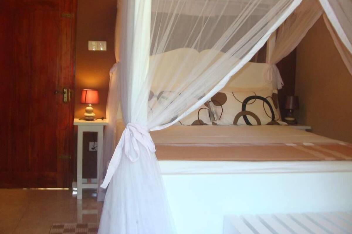 Blackout curtains, iron/ironing board, free WiFi, bed sheets