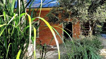 Deluxe Cottage, Multiple Beds, Non Smoking, Balcony | 1 bedroom, premium bedding, iron/ironing board, travel crib