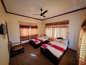 Deluxe Quadruple Room, Smoking | Premium bedding, free WiFi, bed sheets - Hotel Cordial (Pokhara)