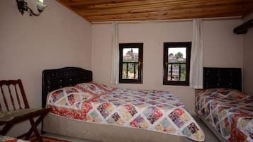 Family Quadruple Room | Desk, blackout drapes, iron/ironing board, free WiFi