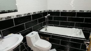 Deep-soaking bathtub, free toiletries, towels