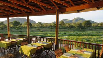 Breakfast and dinner served, local cuisine