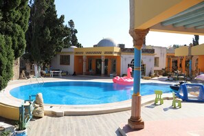 Outdoor pool, pool umbrellas, pool loungers