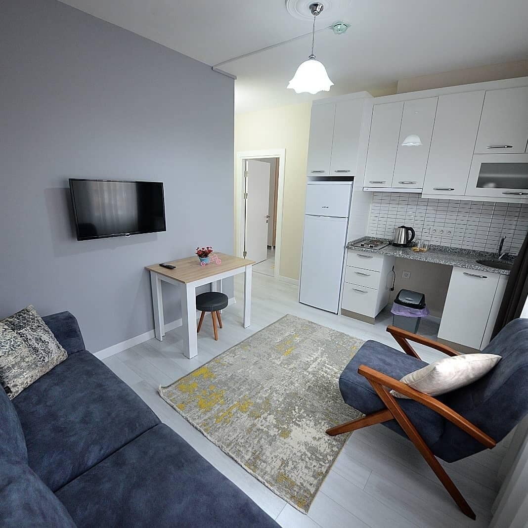 家庭套房 | 起居区 | 82-厘米LED 电视 （配备卫星频道）、电视