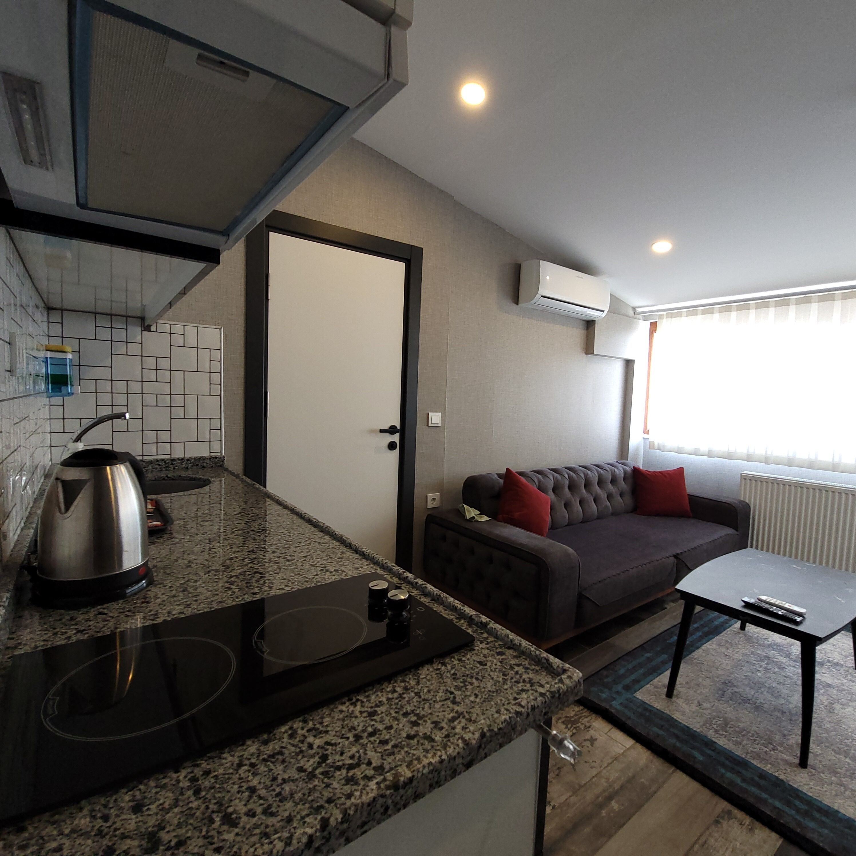 Panorama Studio Room | Living area | 82-cm LED TV with satellite channels, TV