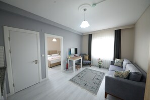 King Suite | Ruang tamu | 82 cm televisyen LED dengan satelit, TV 