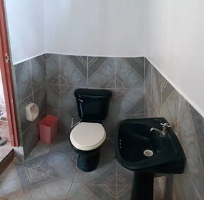 Basic Bungalow, 1 Double Bed, Non Smoking, Private Bathroom | Bathroom | Shower, towels, toilet paper