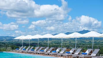Outdoor pool, open 8:00 AM to 8:00 PM, pool umbrellas, sun loungers