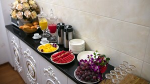 A buffet table with various food items and condiments. - Hanoi Golden Hotel (Hanoi)