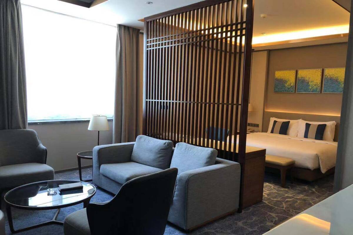Deluxe Suite | Minibar, desk, blackout drapes, iron/ironing board (on request)
