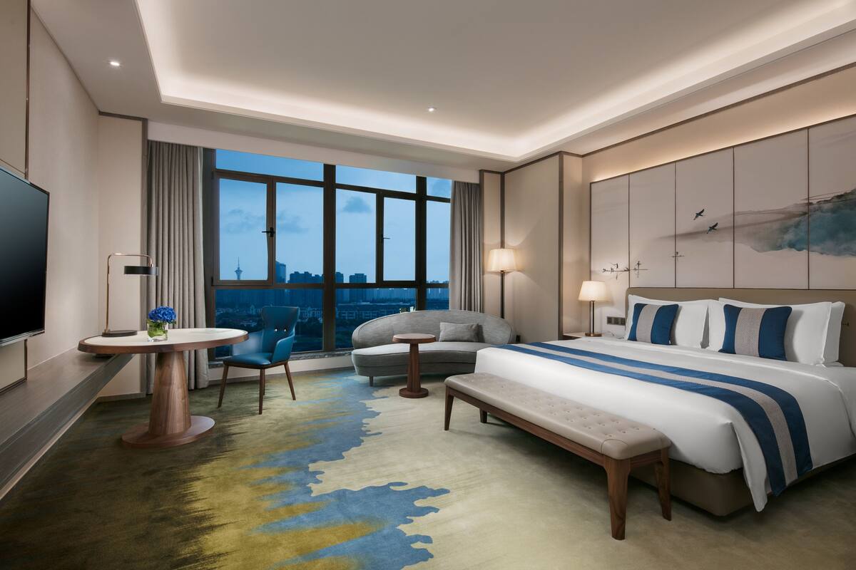 Deluxe Double Room | Minibar, desk, blackout drapes, iron/ironing board (on request)
