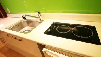 Family Room | Private kitchenette | Fridge, electric kettle