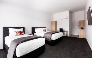 Premium bedding, pillow-top beds, desk, soundproofing
