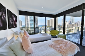 Apartamento, 2 quartos, 2 banheiros, vista para o oceano | Individualmente mobiliados, escrivaninha, ferros/tábuas de passar roupa