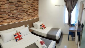 A hotel room with two beds, a wooden wall, a desk, and a window with curtains. - dr96inn (Kuantan)
