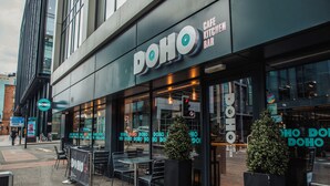 A DOHO cafe with outdoor seating and a modern facade. - Ibis Styles Glasgow Central (Glasgow)