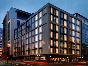 A modern hotel with a glass facade, multiple floors, and a prominent signage for ibis hotels. - Ibis Styles Glasgow Central (Glasgow)
