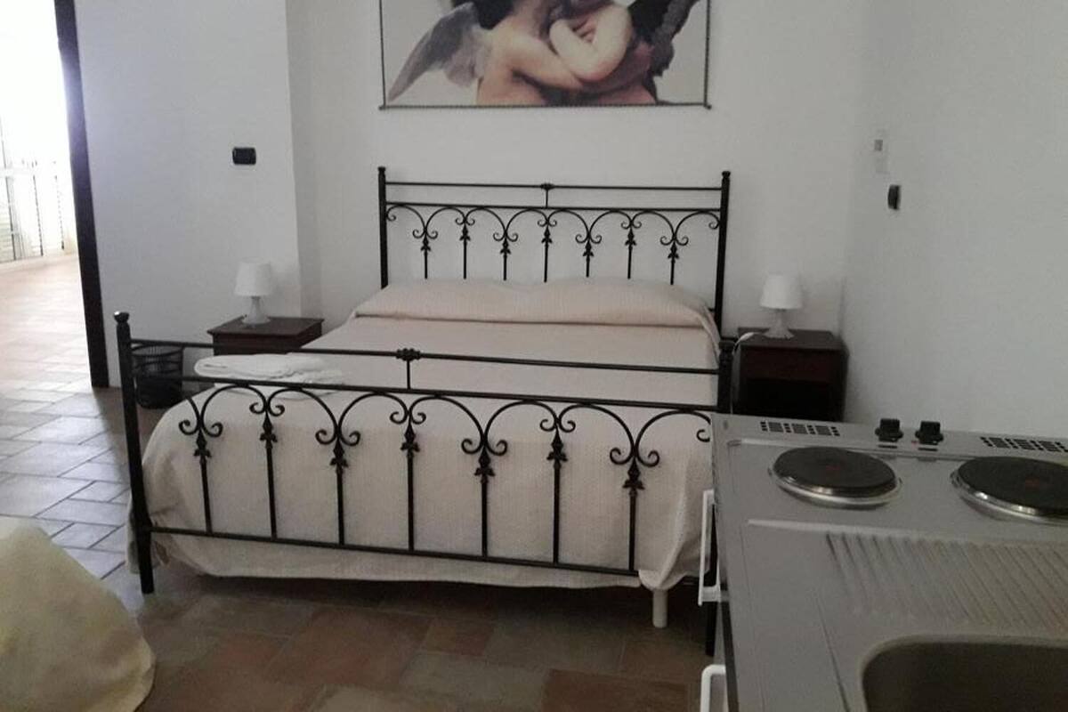 Habitación familiar, baño compartido | Escritorio, insonorización, wifi gratis y ropa de cama