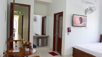 Family Room | Desk, laptop workspace, blackout curtains, soundproofing