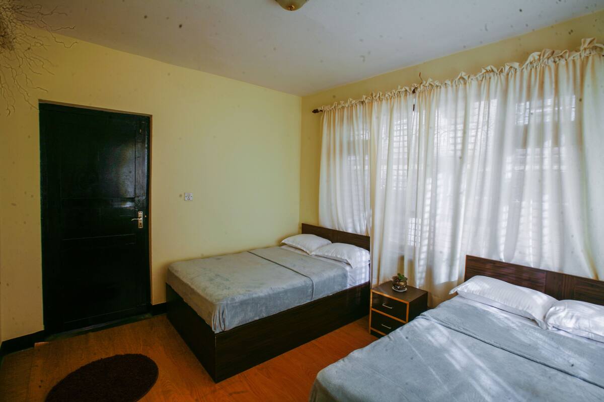 Deluxe Twin Room, Multiple Beds, Non Smoking | In-room safe, WiFi (free), individually decorated