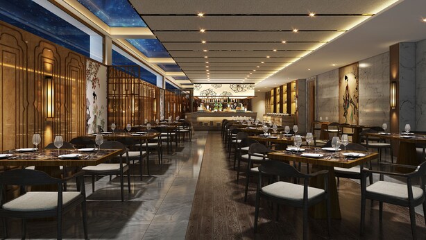 A spacious restaurant with high ceilings, modern lighting, and a central bar area. - VANHONG Hotel (Guangzhou)