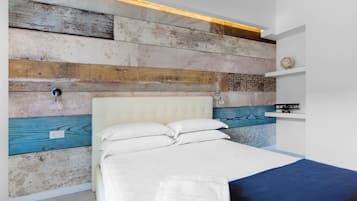 Deluxe Double Room | Minibar, in-room safe, individually decorated, individually furnished