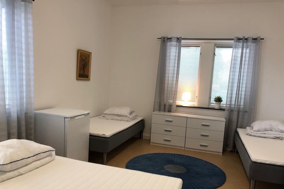 Family Room | Blackout drapes, iron/ironing board (on request), WiFi (free)
