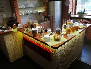 A buffet with various food items and beverages. - Hotel Club Trio (Ostrava)