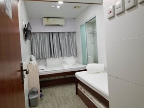 Cubrecamas, cortinas blackout, wifi gratis y ropa de cama 