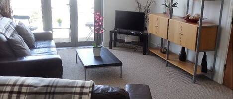 Attic Apartment | Living area | Flat-screen TV