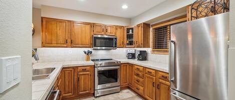 Condo, 2 Bedrooms | Private kitchen | Coffee/tea maker