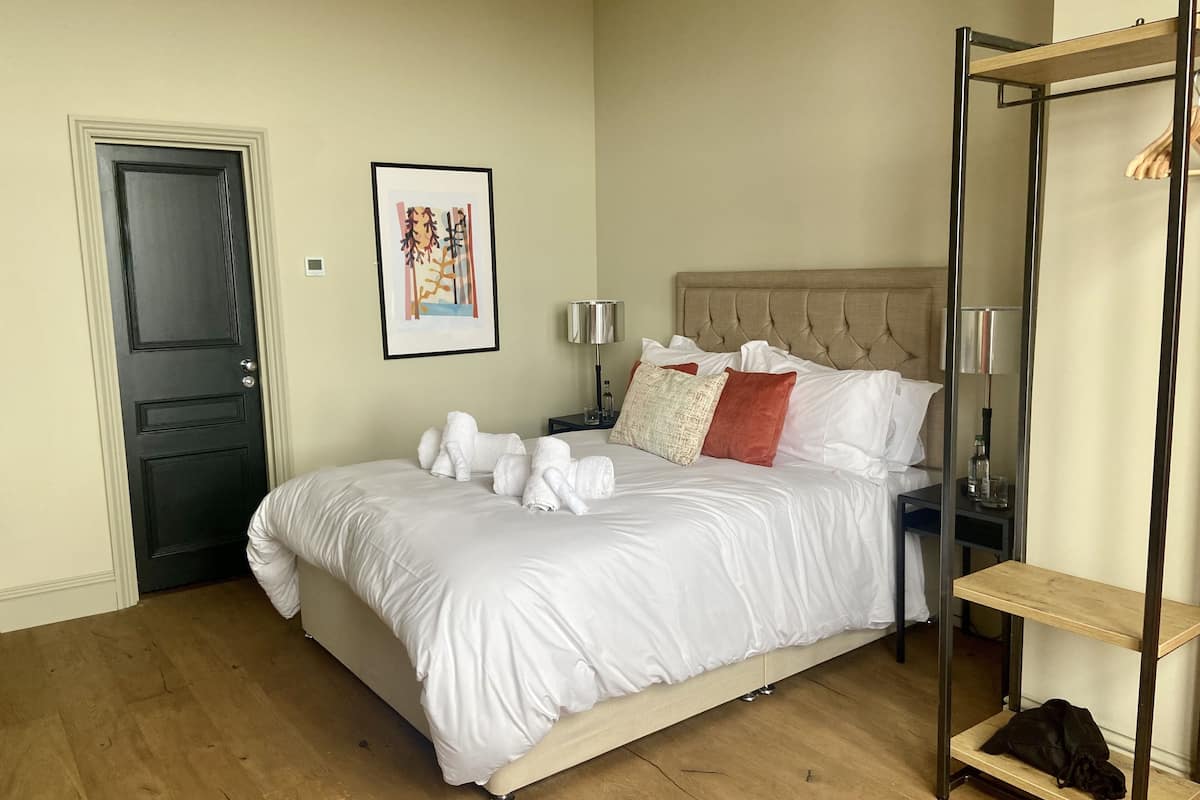 Premium bedding, desk, laptop workspace, bed sheets